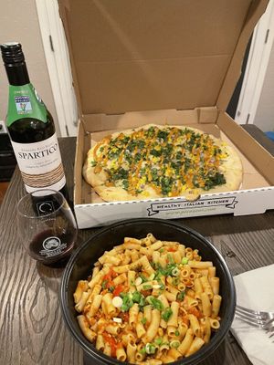 Elote pizza and spicy chipotle chicken pasta  at Picazzo's Organic Italian Kitchen in Sedona