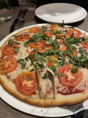 Vegan pizza margarita, with gluten-free corn crust   at Picazzo's Organic Italian Kitchen in Sedona