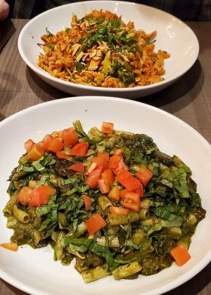 Plant based sausage and mushroom pesto pasta, and Thai style peanut plant based chicken pasta. at Picazzo's Organic Italian Kitchen in Sedona