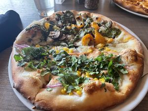 Half and half. Vegan florentine and vegan Elote    at Picazzo's Organic Italian Kitchen in Sedona