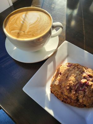 Soy latte and vegan raspberry oat scone at Diva Espresso in Seattle