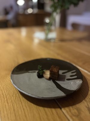 Quince with carobs coffee and vegan hazelnut cheese  at Galerija Okusov in Petrovce