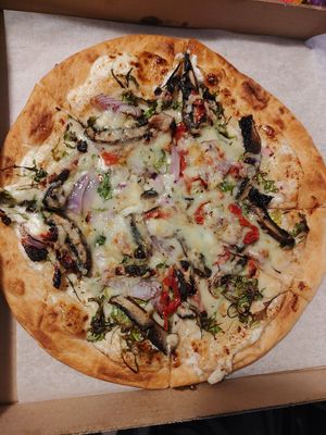 Trippy truffle pizza at Serenity Pizza in Kingston