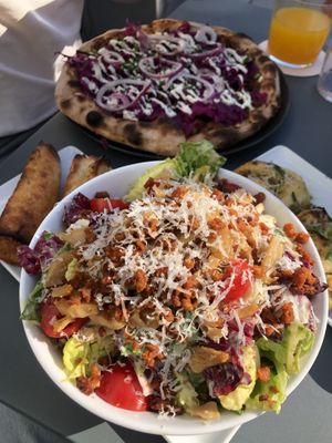 In front: Caesar salad with v-chicken 9,5/10  at Virtuous Pie in Cologne