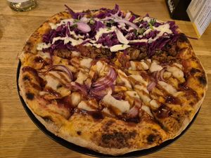 Half Hawaiian summer, half Doner pizza at Virtuous Pie in Cologne