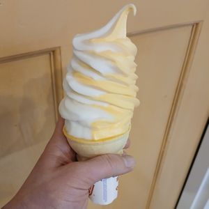 Vegan Twist Cone (Vegan Vanilla and Orange Dole Whip) at Countryside Cones in Omaha