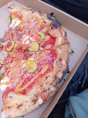 Cheeseburger pizza, it tastes like a burger on dough, and it is goooood. at El Vato Loco in Barcelona