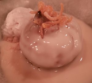 Vegan sticky toffee pudding with custard and vanilla ice cream at The Pier in Harwich