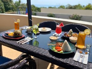 Outdoors dining
 at The Happinezz Hills Karimunjawa in 