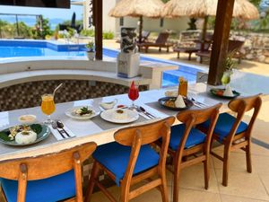 Dining at the Pool bar at The Happinezz Hills Karimunjawa in 
