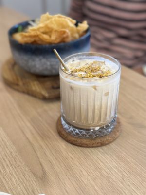 Osmanthus Latte with the vegetarian curry mee in the background   at Mangga Vegetarian Cafe - 美佳素轩  in Seri Kembangan