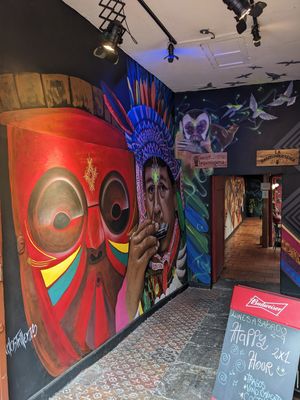 The entrance with graffiti at La Hamburgueseria in Bogota