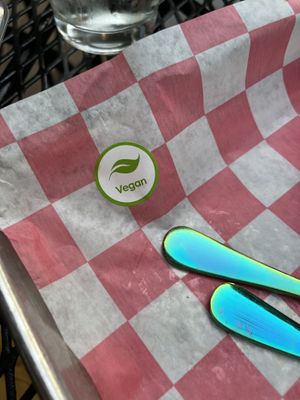 My plate has a special sticker 🌱   at Ollie's Madison in Fitchburg