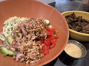 Make your own bowl w/ bbq jackfruit, romaine, pineapple slaw, avocado, cucumber, tomato, grilled onions (slightly too undercooked) with Cajun remoulade.  at devil's lettuce in Richmond