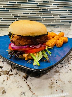 Fried Tofu Sando special with small order of tots. So delicious, so filling. at devil's lettuce in Richmond