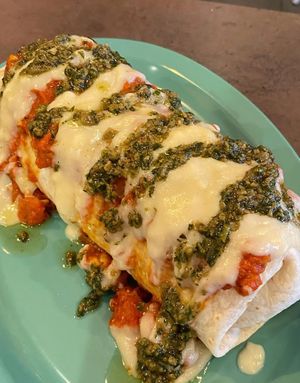 Da Jabroni: a meatball and baked rigatoni burrito topped with marinara, bechamel, and pesto. (Vegan) at devil's lettuce in Richmond