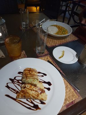 Vegetable crepe and vegan chickpea curry. The curry is by far the best vegan dish in this restaurant and probably one of the best I've ever had at Omali in Sao Tome