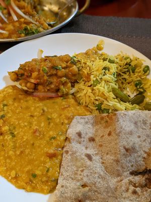 Tarka daal, chana masala, pilau rice and aloo gobi paratha at Aroma Indian Restaurant in Ninh Binh