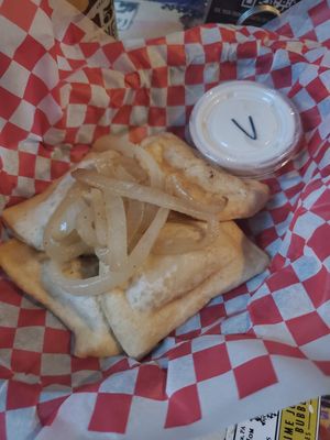 Potato and onion vegan pierogi with fried onions with vegan sour cream at Tattooed Mom in Philadelphia