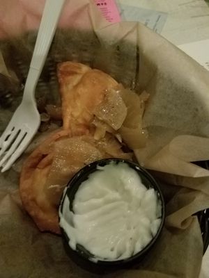 Vegan pierogis with fried onions and vegan sour cream at Tattooed Mom in Philadelphia