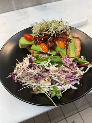 Tomato avocado on sourdough bread  at Copenhagen European Kitchen & Bakery in Katy