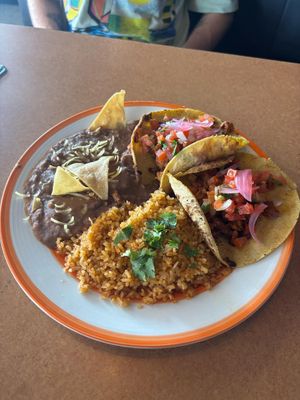 Vegan taco combo with mexican rice and refried beans at Tacoholics in Boquete