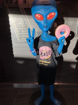 My new boyfriend   at DEN - Voodoo Doughnut - Concourse B in Denver
