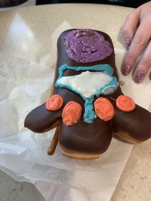 voodoo doll!!! there’s raspberry filling!!!   at DEN - Voodoo Doughnut - Concourse B in Denver