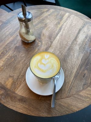 Golden latte 🫶  at Full Circle Coffee in Ghent