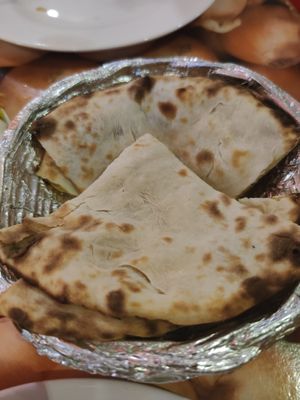 Alo Naan (Plain naan with potato, ask them to not add butter) at Kohinoor Indian Restaurant in Koh Samui