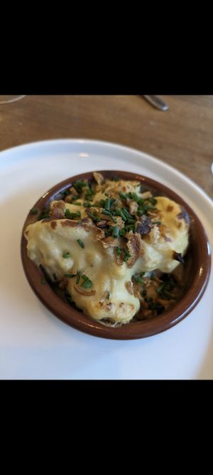 Christmas taster menu 2023 cheesy cauliflower and crispy onions (incredible) at Nooch Bar and Kitchen in Stirling