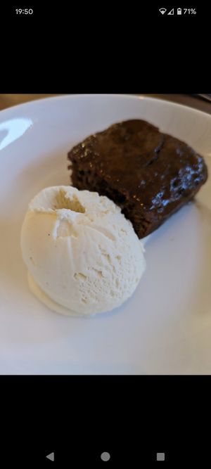 Christmas taster menu 2023 white chocolate and macadamia nut ice cream and tamarind sticky toffee pudding at Nooch Bar and Kitchen in Stirling