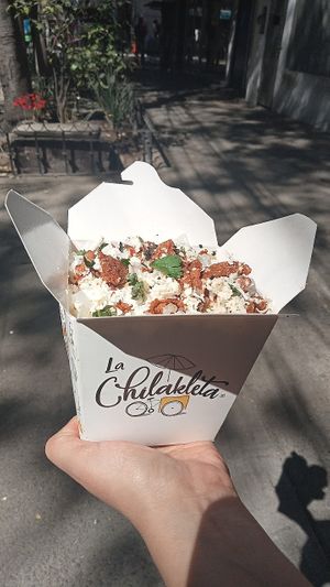 Chilaquiles en cajita con salsa verde y con pastor de soya, queso y crema vegana de almendras at La Chilakleta Río Tiber in Mexico City