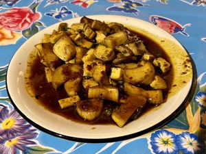 Pan Seared Mushrooms! Cilantro, scallions, chopped tofu, black bean & Szechuan peppercorn sauce and a whole gang of mushrooms. This is a great dish!  at Belly in Gilbert