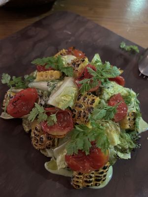 Grilled corn and tomato salad  at Panigyri Festival Food in Santorini