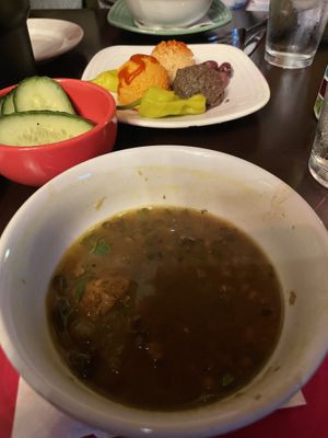 Hummus trio and lentil soup - don’t get pita it has eggs in it…get cucumbers for dipping.  Brussels and potatoes can be cooked in oil rather than butter   at Santiago's Bodega in Key West