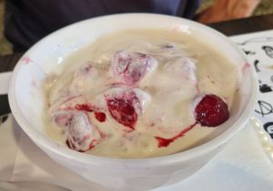 Crema de "llet" vegana amb fruita vermella at La Cantina De Balenya in St Miquel De Balenya
