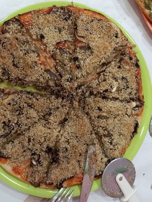 Pizza parmesana. at Mundo Vegan in Barcelona