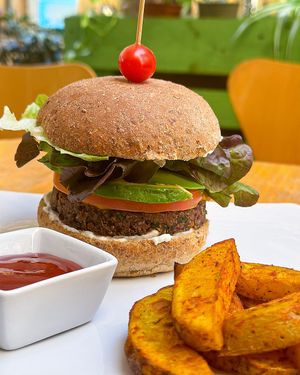 Vegan burger with fries at Mundo Vegan in Barcelona