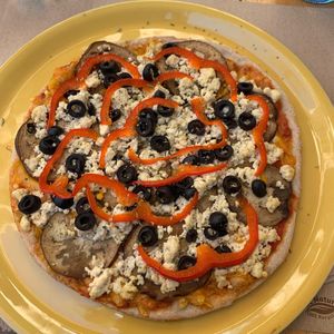 Mini pizza muntaner at Mundo Vegan in Barcelona