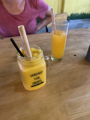 Good orange juice and mango smoothie with coconut milk  at Bahn Mi Tron - CircleT in Ninh Binh
