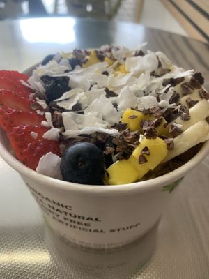 Acai bowl with granola, coconut, bananas, strawberries and blueberries   at RawASF in Elk Grove