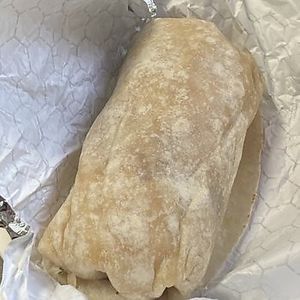 Large burritos with rice, beans, lettuce, onions, cilantro, and tomato at Lilly's Mexican Cuisine in Roseburg