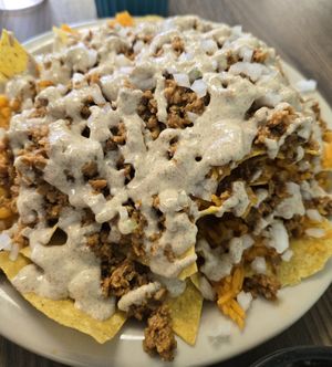 Nachos , no beans add rice and extra cheese at Lilly's Mexican Cuisine in Roseburg