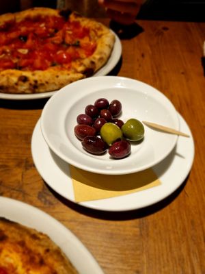 "three kinds of olives" (that was the whole portion) at Trattoria Pizzeria & Bar LOGIC in Nagano