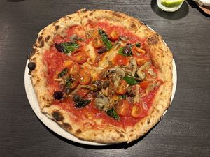 Vegan Marinara with extra olives and mushrooms  at Trattoria Pizzeria & Bar LOGIC in Nagano
