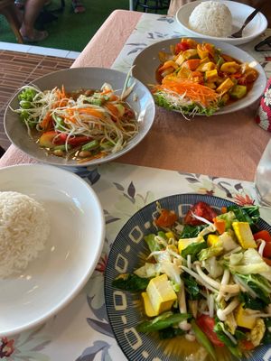 Fried sweet and sour sauce with tofu, papaya salad, rice and fried mixed vegetables with tofu at Chai Thaifood in Phuket