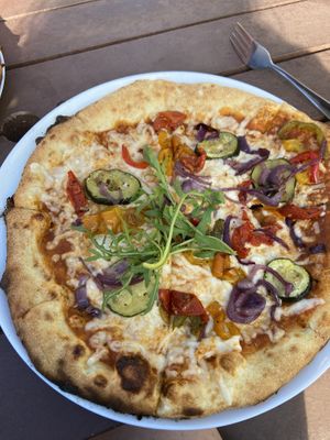 Mediterranean vegetable pizza with vegan cheese  at The Quiet Site in Penrith