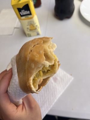 Empanada pastelera aceituna, buena cantidad de relleno  at Tú y yo in Algarrobo