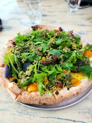 Vegan Mediterranean pizza at Piacè in Raglan